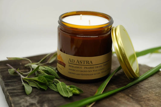 Amber apothecary jar Ad Astra soy wax candle with double wick and herbs on wood