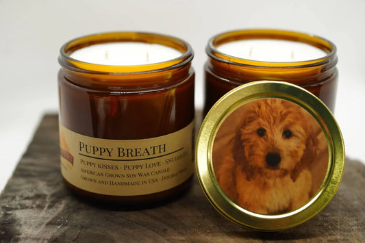 Amber jar soy wax candles labeled Puppy Breath, double wick, with dog image on lid